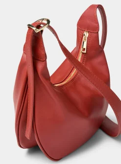 Textured-leather half-moon crossbody bag