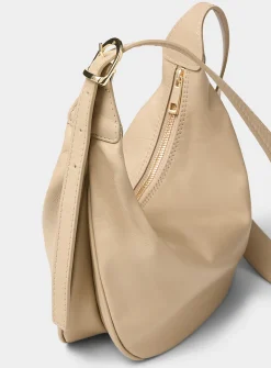 Textured-leather half-moon crossbody bag
