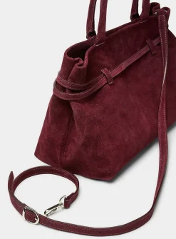 Thin-belt suede bag