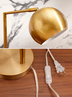 Tilting golden table lamp