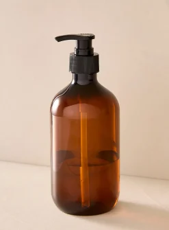Tinted plastic soap dispenser