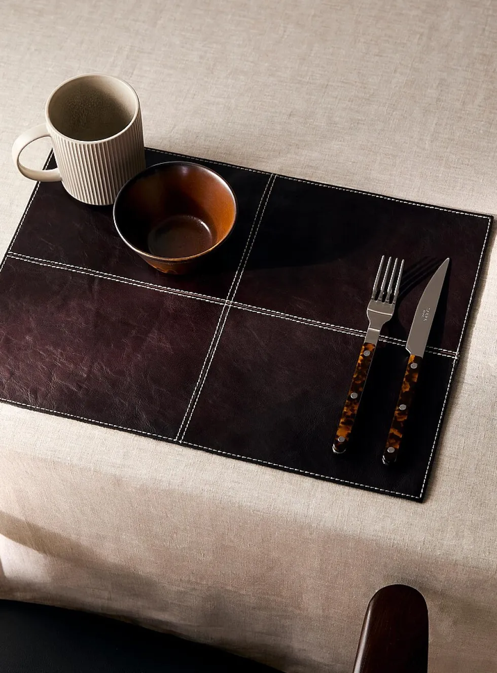 Topstitched leather placemat