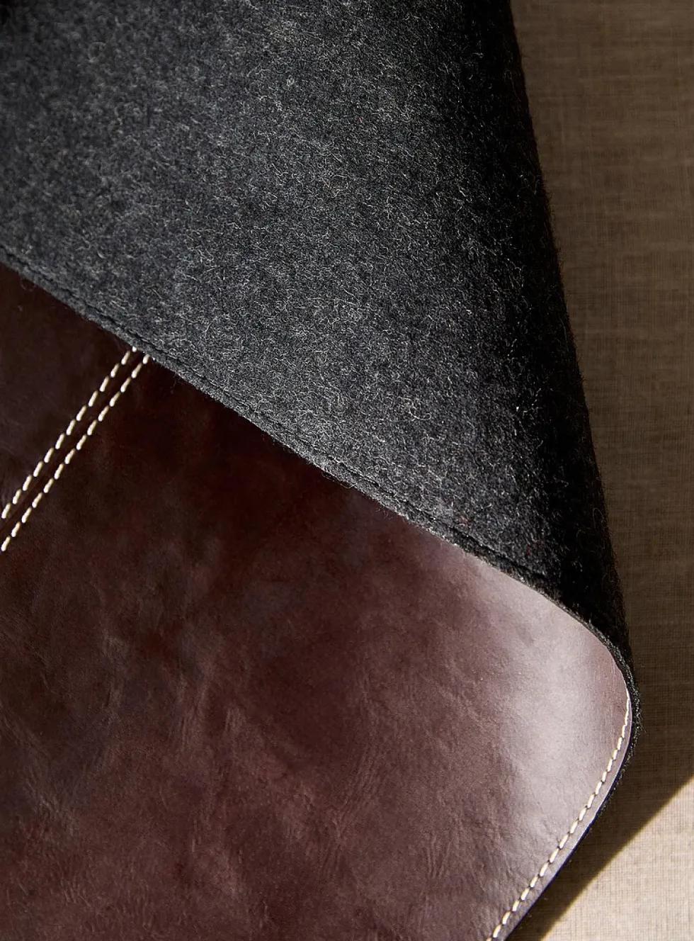 Topstitched leather placemat