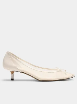Tourni twisted heel sheer pumps