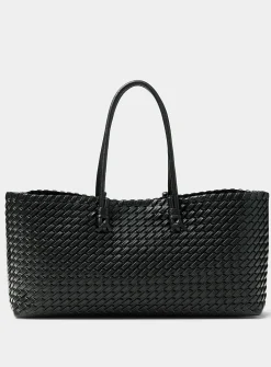Tubular handle braided baguette bag