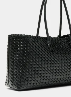 Tubular handle braided baguette bag