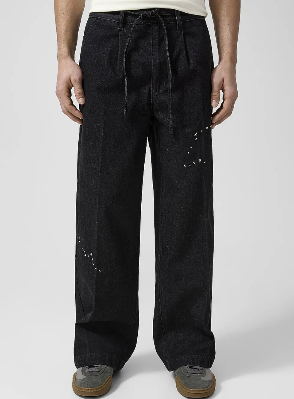 Vertical pleating topstitched jean