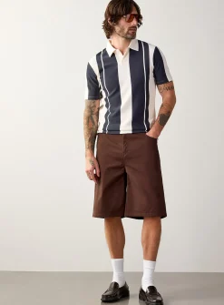 Vertical stripe ribbed polo