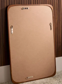 Walnut finish subtly rounded mirror