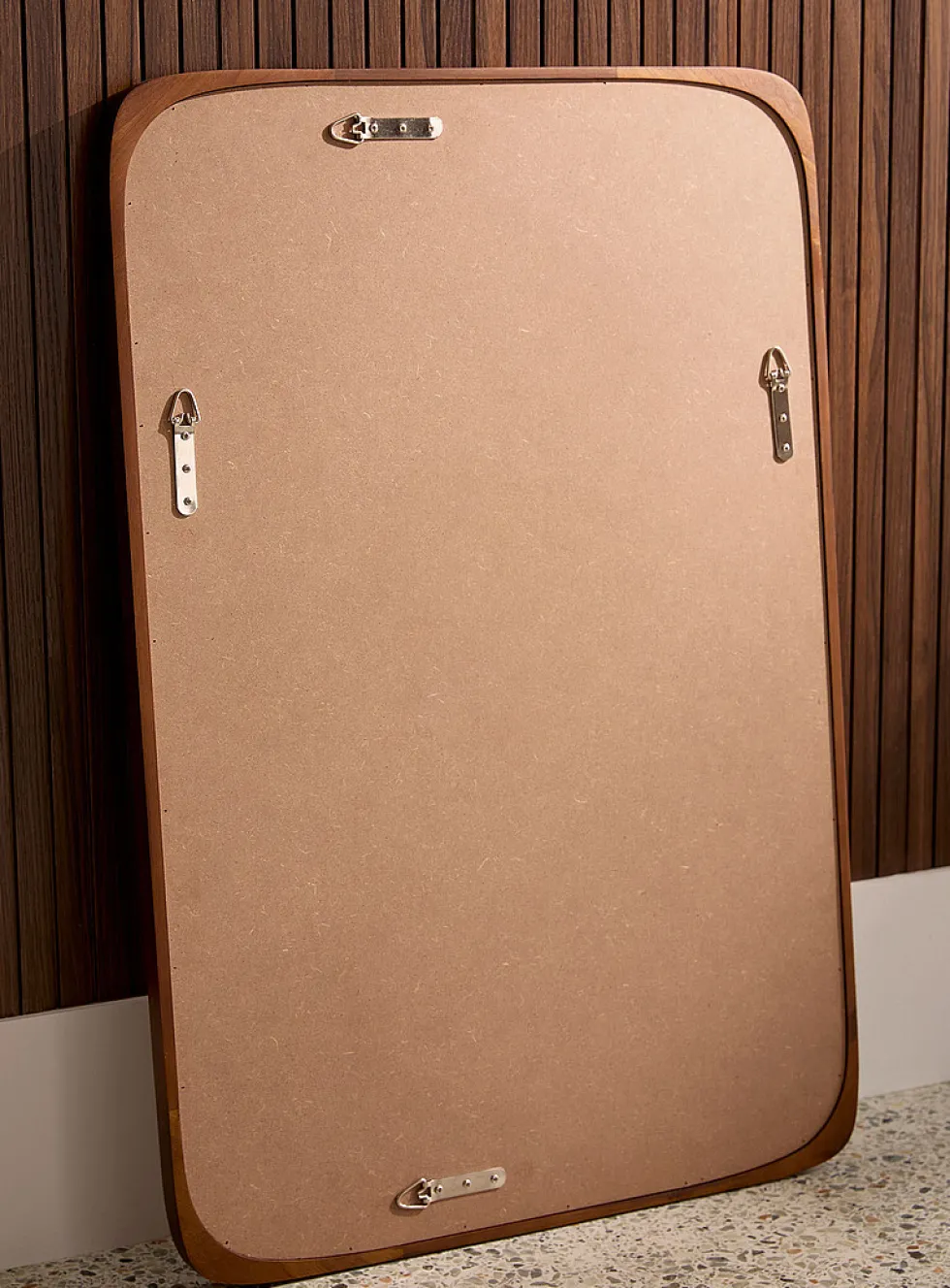 Walnut finish subtly rounded mirror