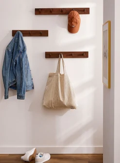 Walnut pegs wall-mounted coat rack