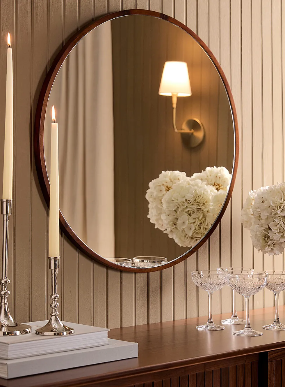 Walnut-finished round frame mirror