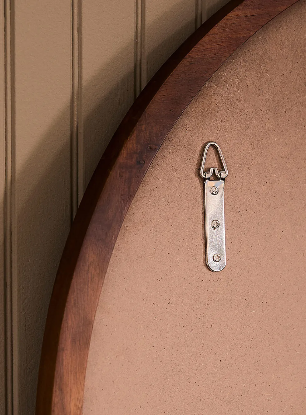 Walnut-finished round frame mirror
