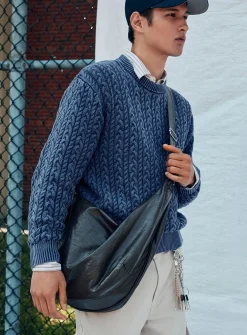 Washed cable-knit sweater