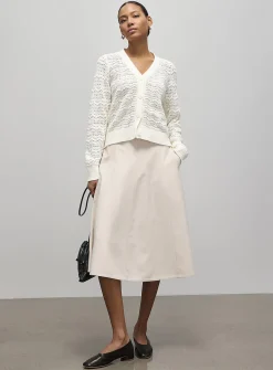 Waves and pompons textured cardigan