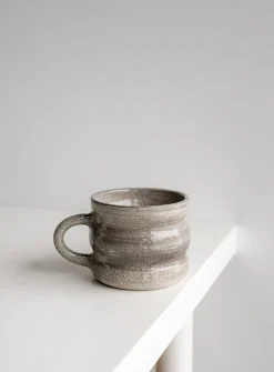 Wavy ceramic cup