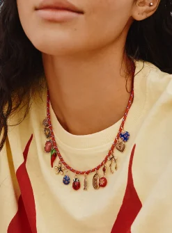 Whimsical charm cord necklace
