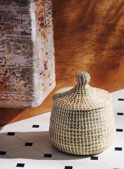 White accents small round seagrass basket
