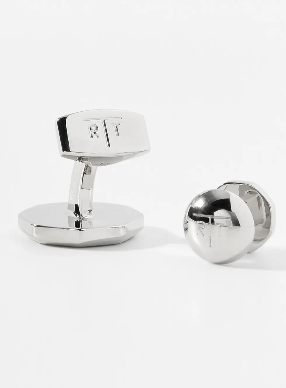White mother-of-pearl cuff links and shirt buttons