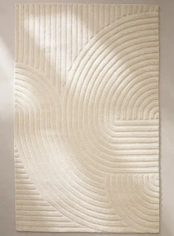 Winding contrast wool artisanal rug