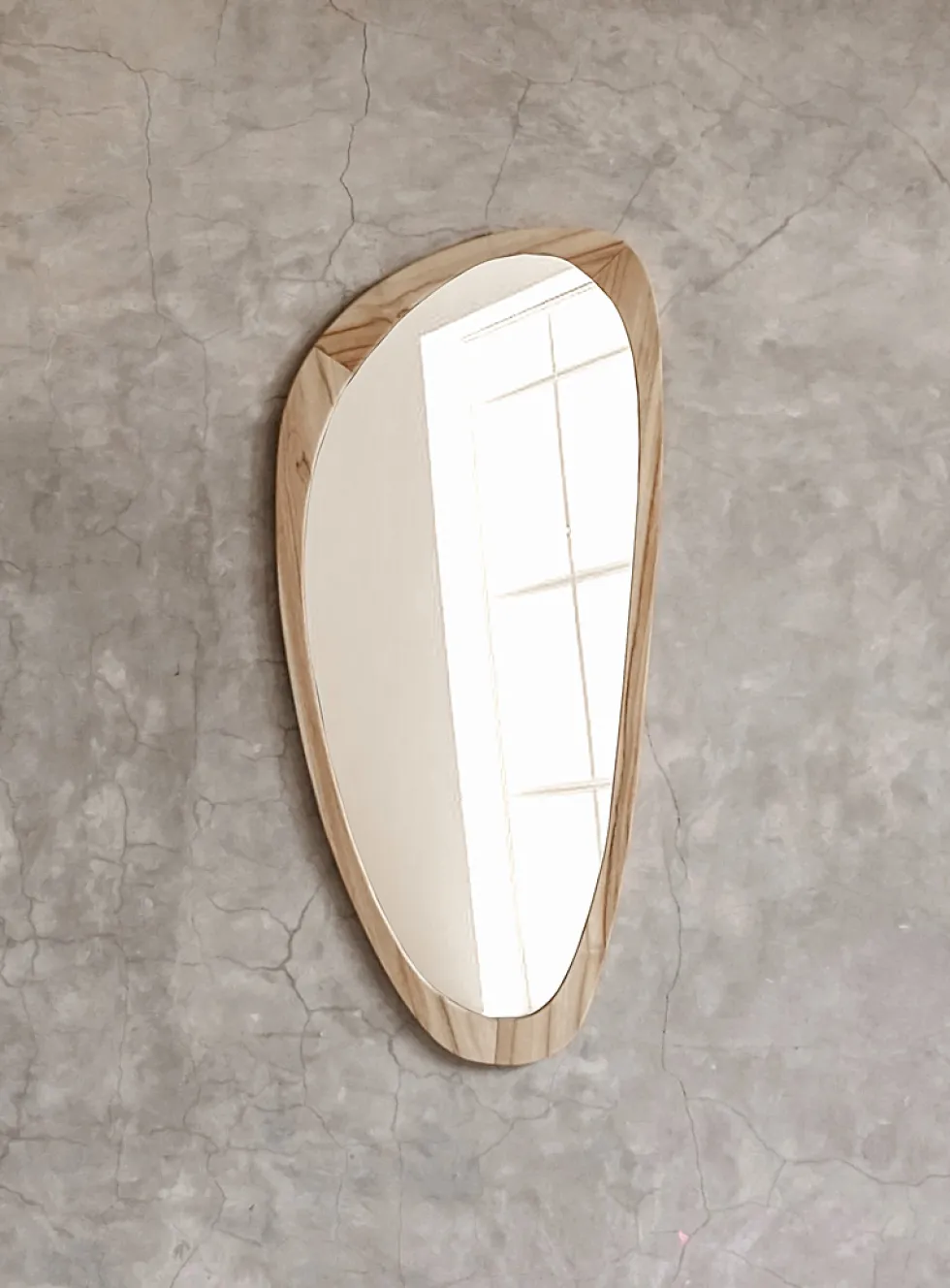 Wood trim asymmetrical mirror