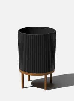 Wooden base grooved planter
