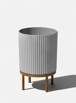 Wooden base grooved planter