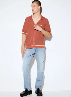 Worn faded blue jean