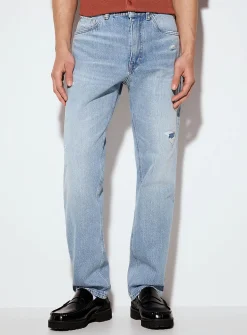 Worn faded blue jean