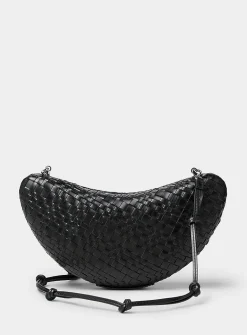 Woven leather crescent clutch