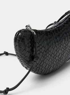 Woven leather crescent clutch
