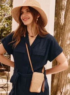 Woven straw and leather phone clutch
