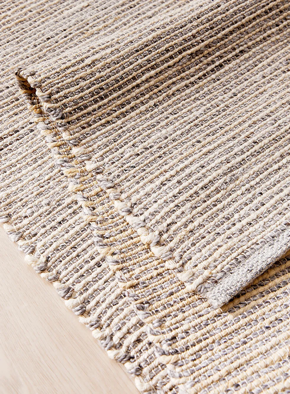 Woven stripes reversible artisanal rug