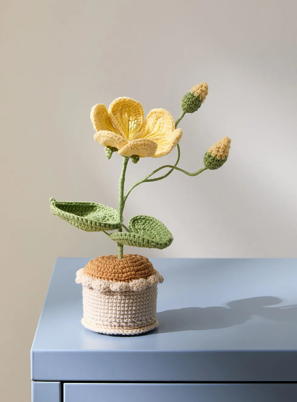Yellow flowers imitation crocheted plant