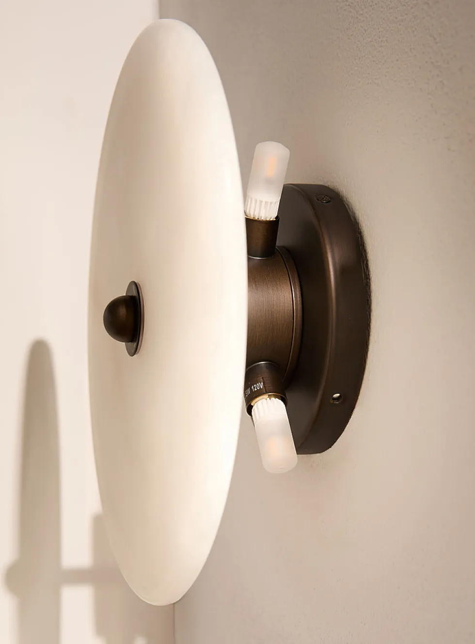 Alabaster saucer wall sconce