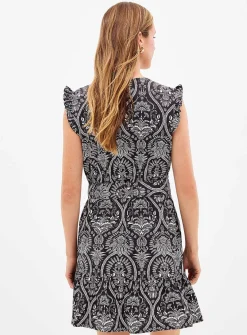 Blac-and-white rococo ruffled dress