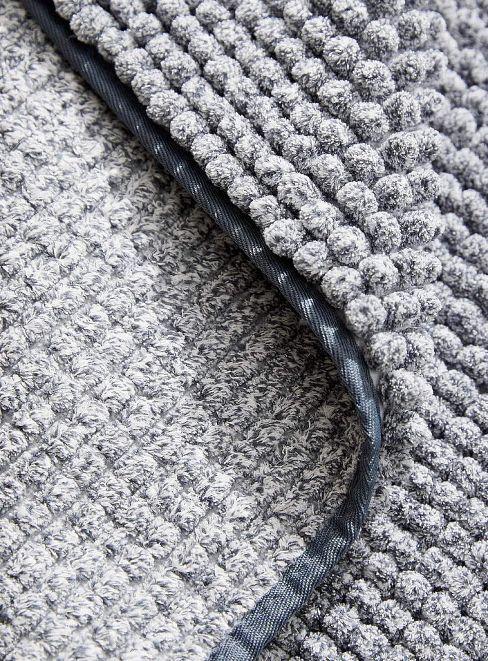 Bleached chenille bath mat