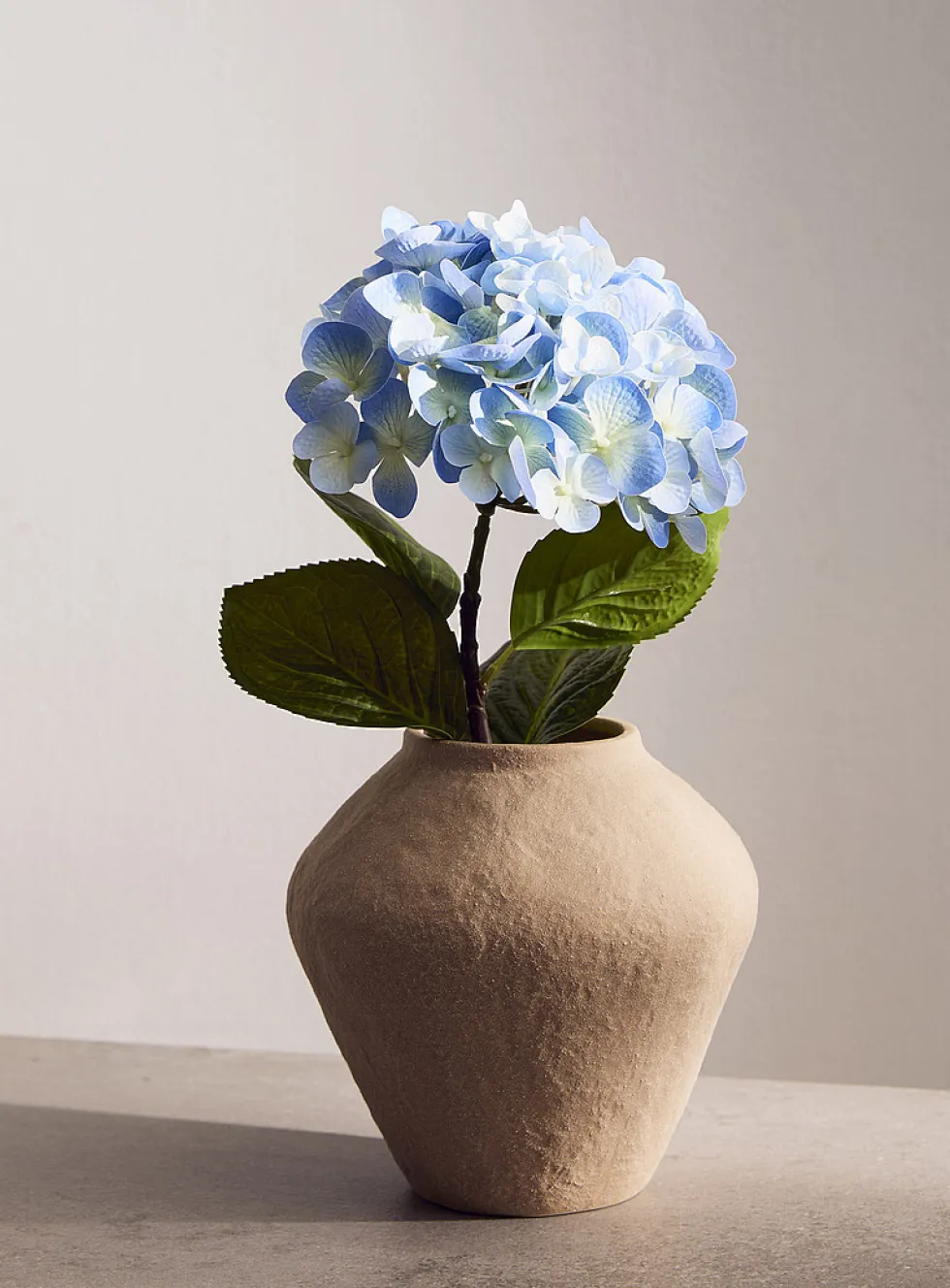 Colourful artificial hydrangea branch