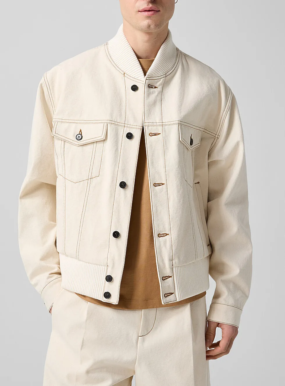Contrasting stitching ivory bomber