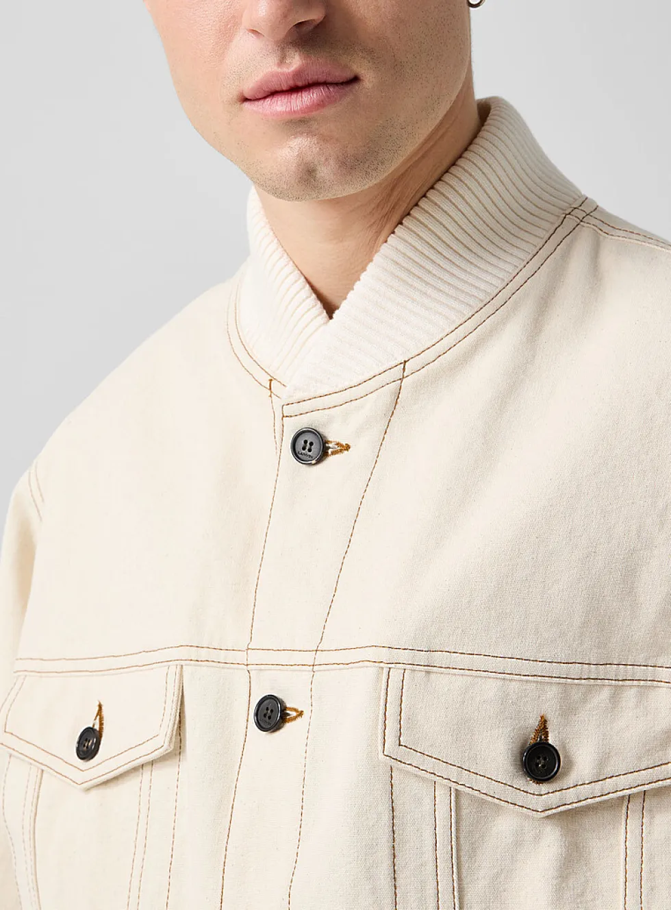 Contrasting stitching ivory bomber