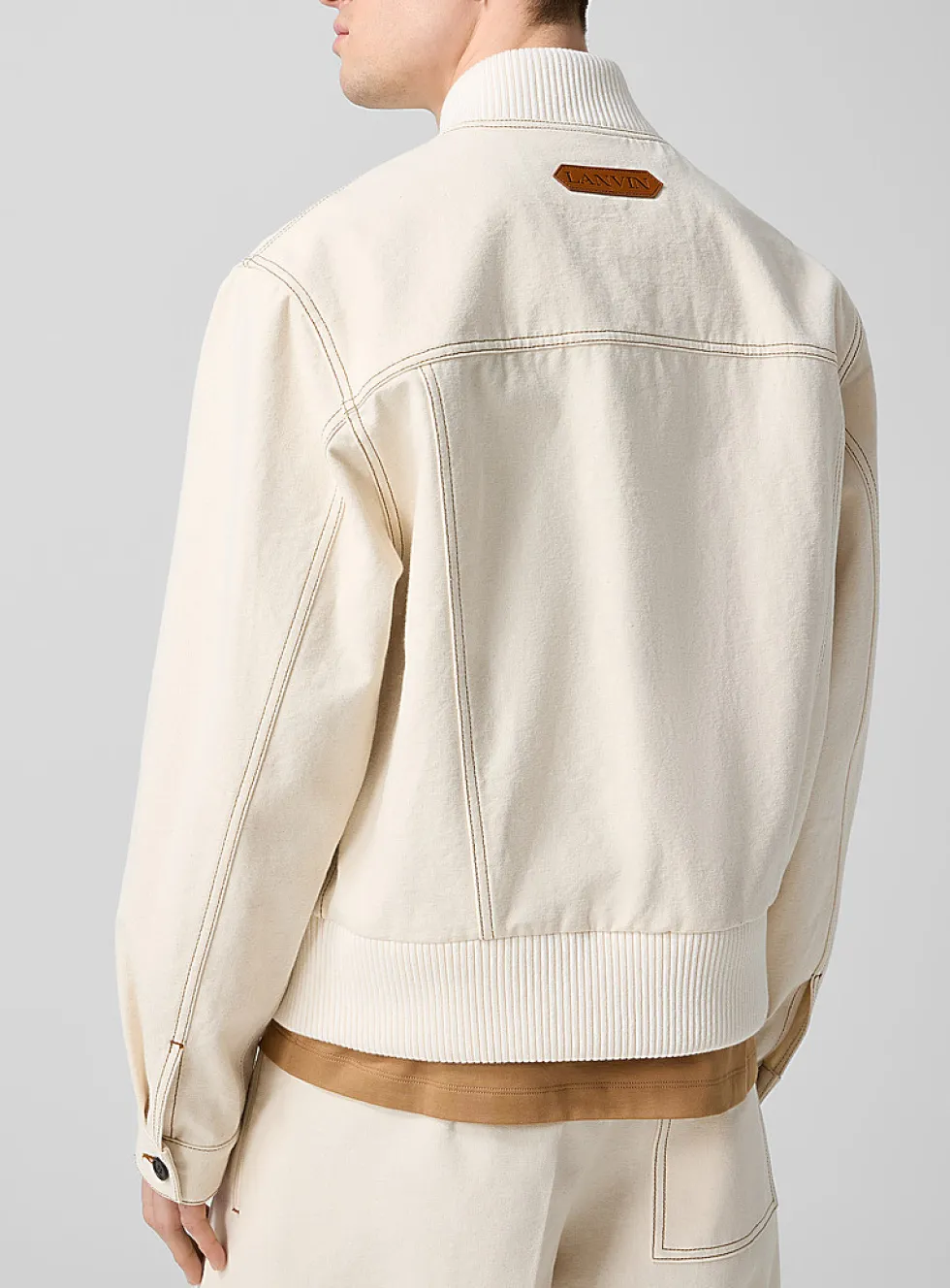 Contrasting stitching ivory bomber