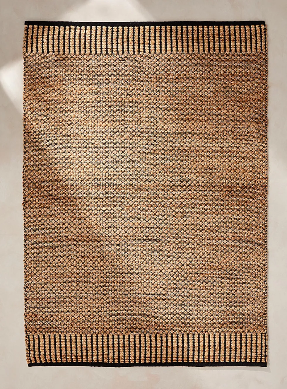Contrasting trim jute artisanal rug
