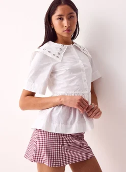Cyrus peplum-waist blouse