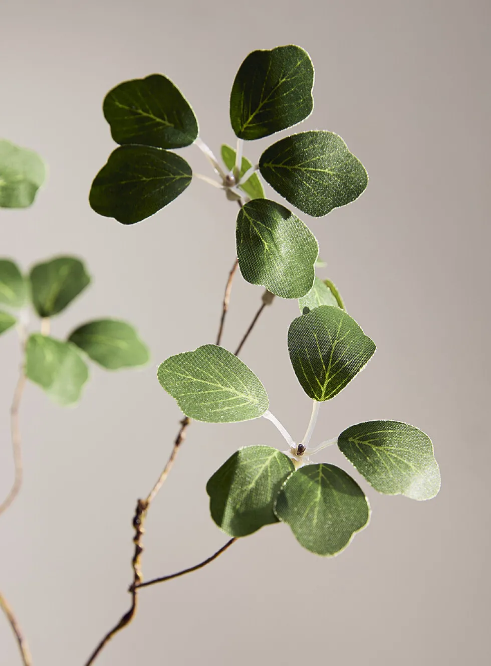 Delicate foliage artificial branch