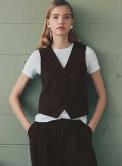 Dressy vest with small buttons