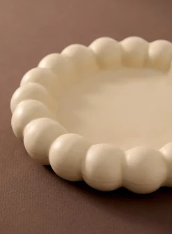 Embossed edge round tray