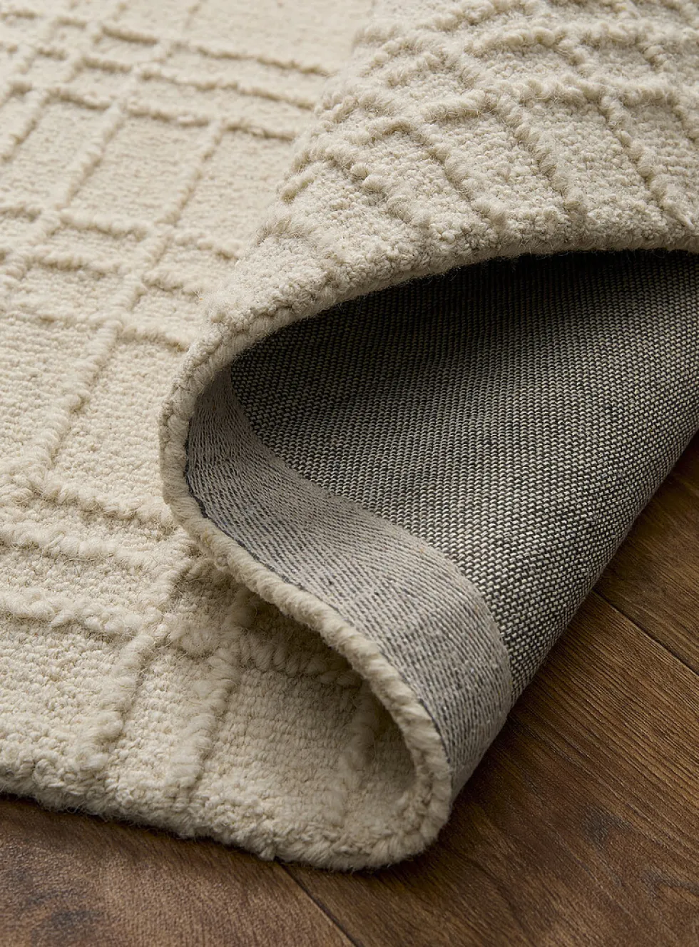 Embossed multi-grid handmade rug