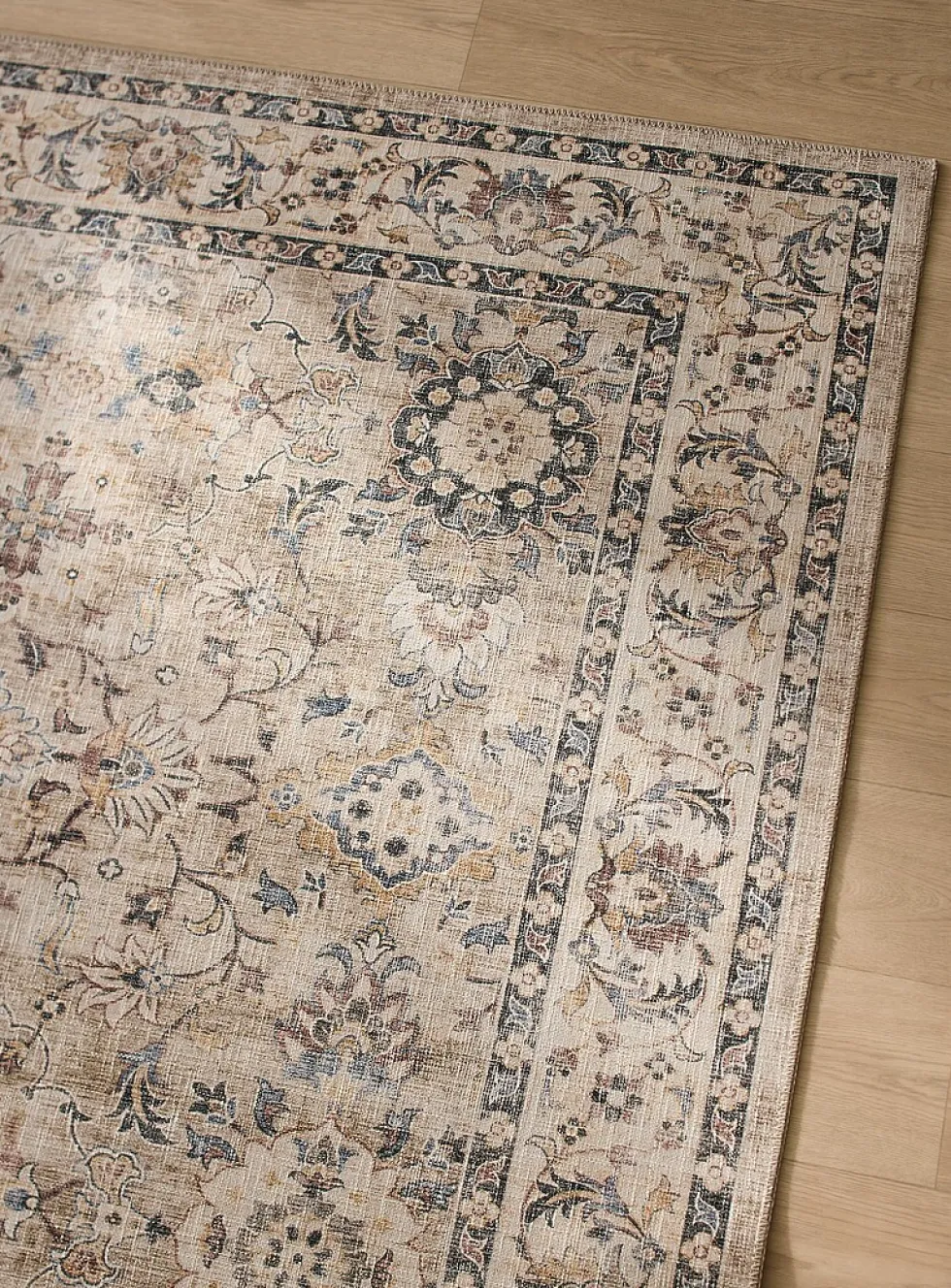 Faded floral fresco rug