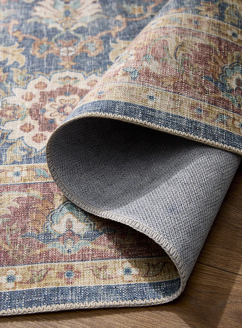 Faded floral fresco rug