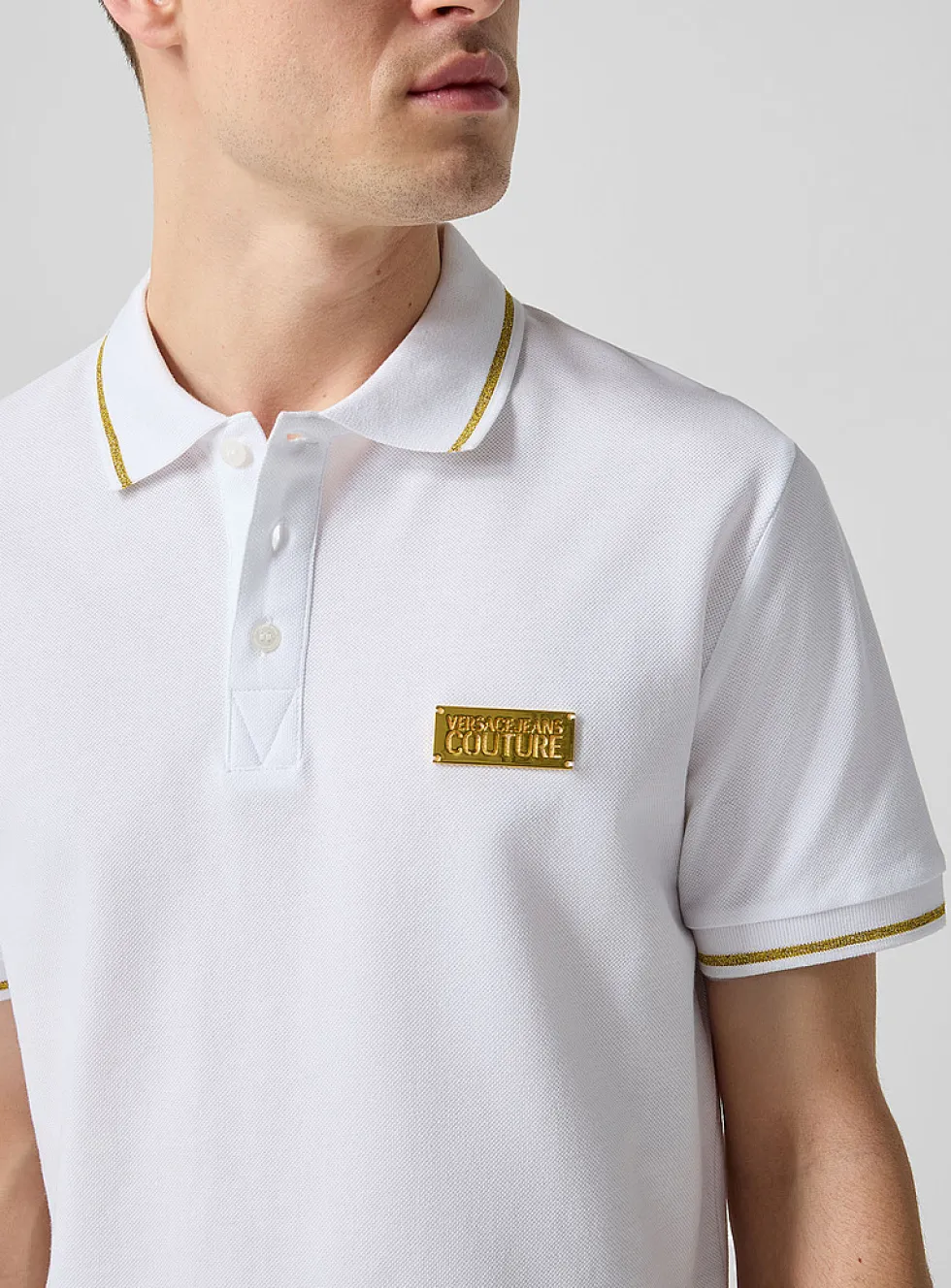 Golden plate and trim piqué polo shirt